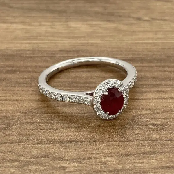 Diamond and ruby halo engagement ring.