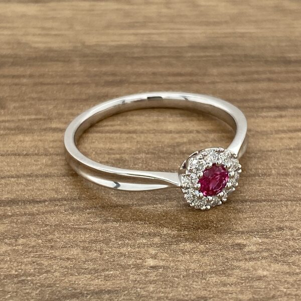 White gold ring with ruby and diamonds.