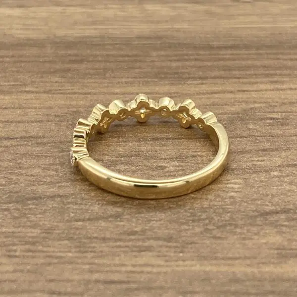 Gold ring with small diamonds.