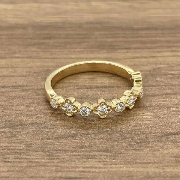 Gold ring with small diamonds.