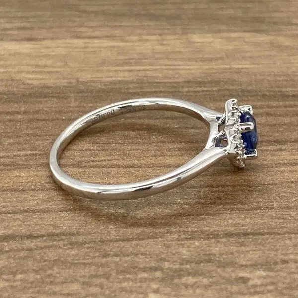 Silver ring with a blue sapphire.