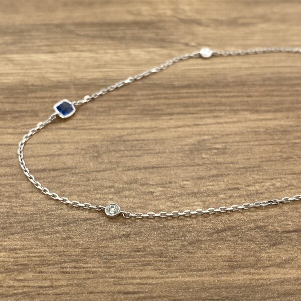 Diamond and sapphire chain necklace.