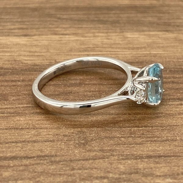 Aquamarine engagement ring with side stones.