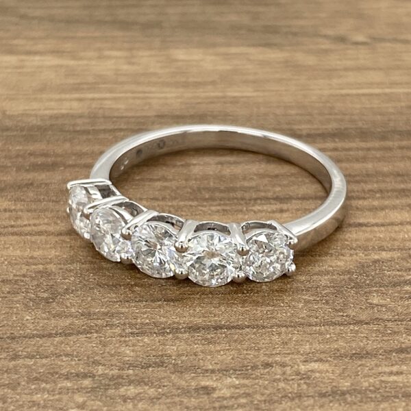 Diamond eternity band with six stones.