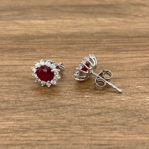 Red ruby and diamond stud earrings.