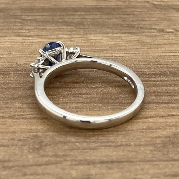 Three stone sapphire and diamond ring.