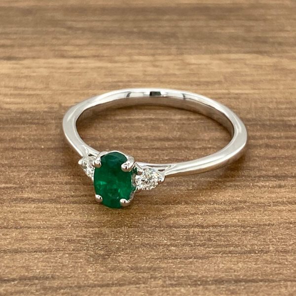 Emerald and diamond engagement ring.