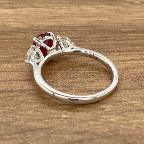 White gold ring with ruby and diamonds.