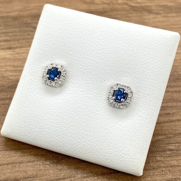 Blue sapphire and diamond stud earrings.