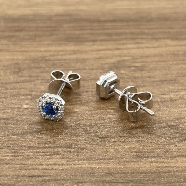 Diamond and sapphire stud earrings.