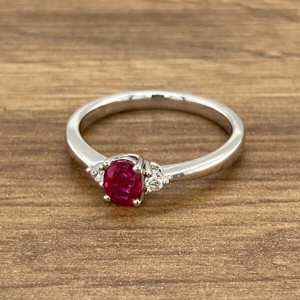 White gold ring with ruby and diamonds.