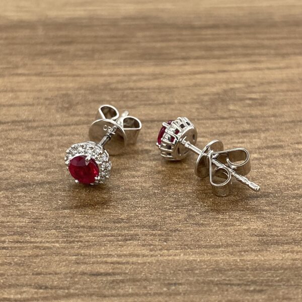 Pair of ruby and diamond earrings.