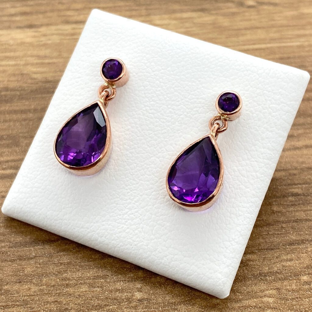 Rose gold amethyst teardrop earrings.