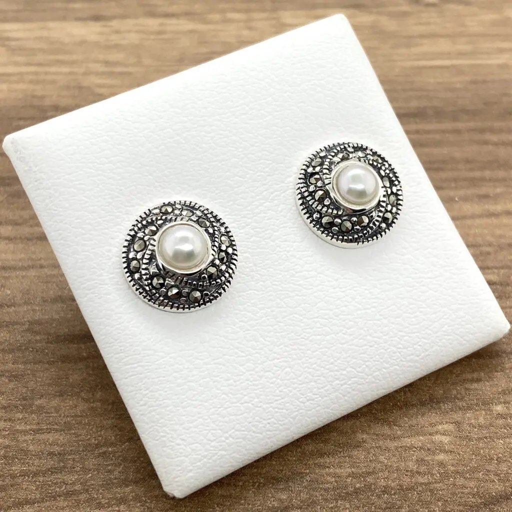 Silver earrings with pearl and marcasite.