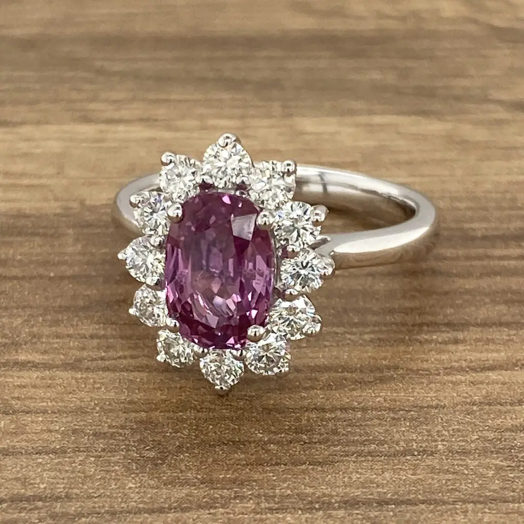 Pink sapphire engagement ring with diamonds.