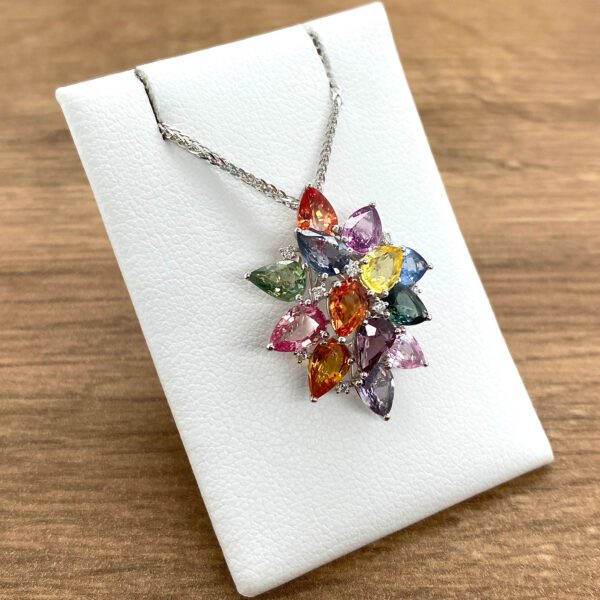 Multicolored sapphire and diamond pendant necklace.