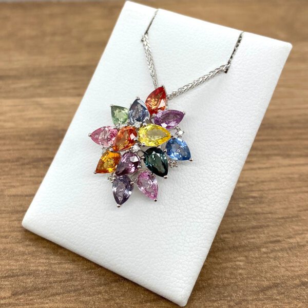 Colorful gemstone flower pendant necklace.