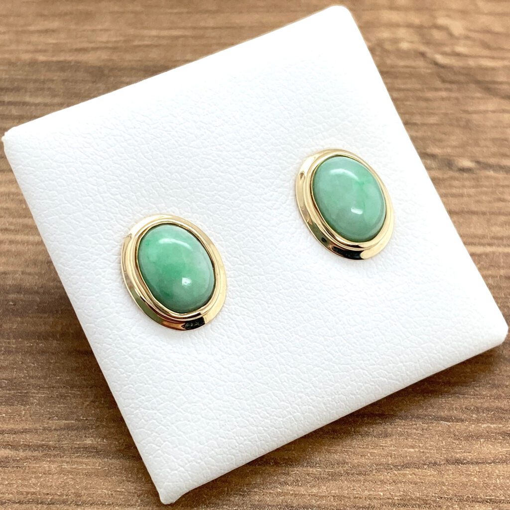 Green jade oval stud earrings.