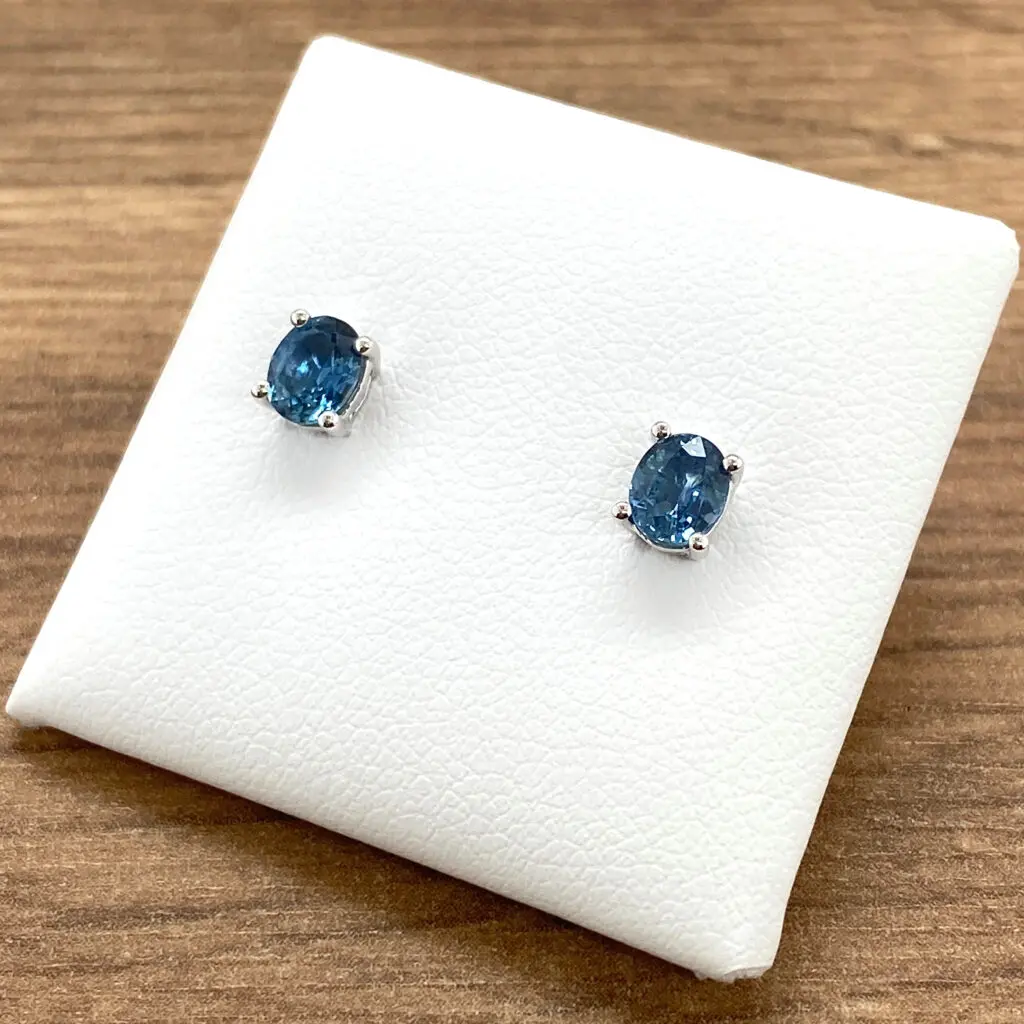 Pair of blue gemstone stud earrings.