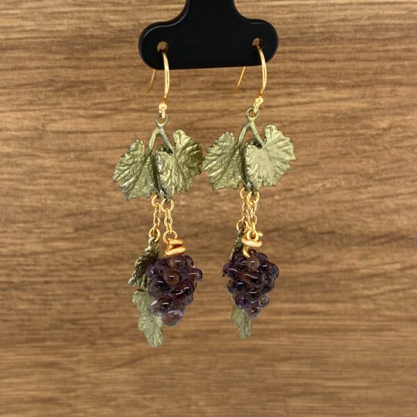 Gold grape earrings with leaves.