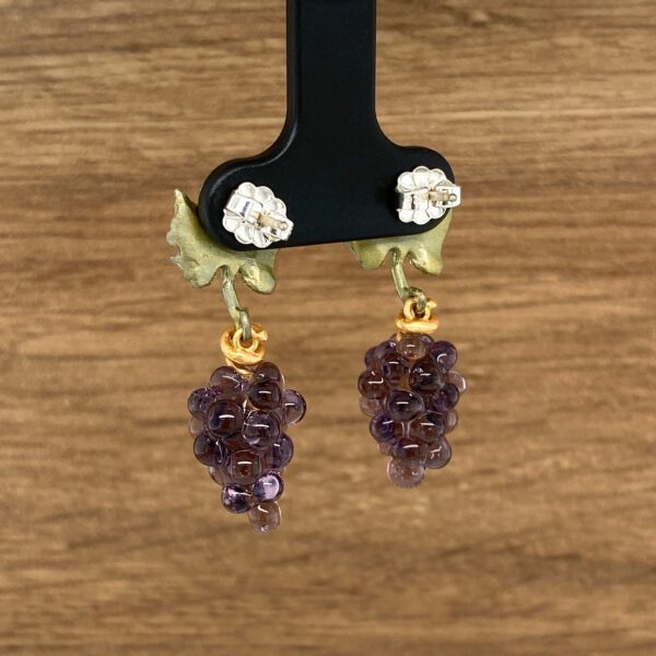 Pair of purple grape earrings.