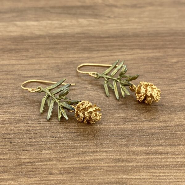 Gold pine cone earrings with sprigs.