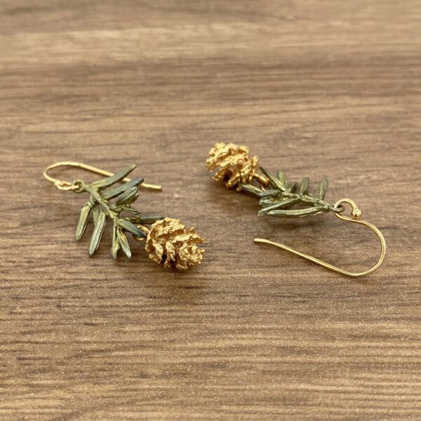 Gold pine cone dangle earrings.