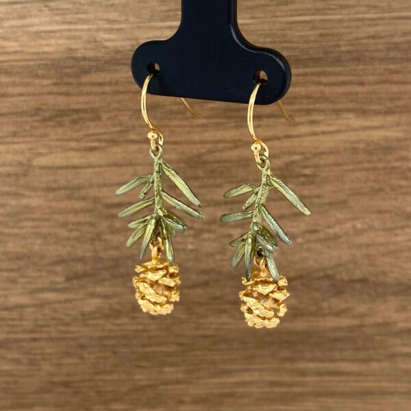 Gold pine cone and branch earrings.