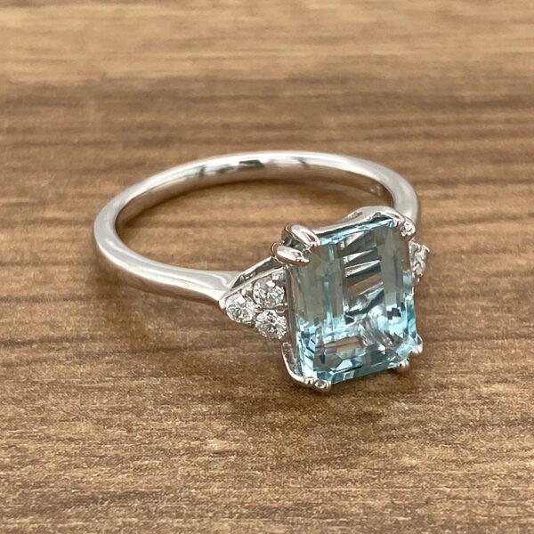 Aquamarine gemstone ring with diamonds.