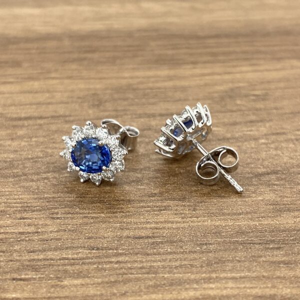 Diamond and sapphire stud earrings.