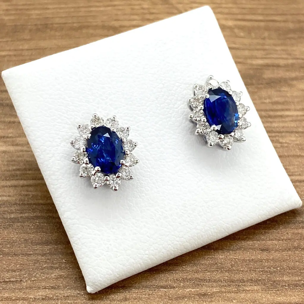 Oval sapphire and diamond earrings.