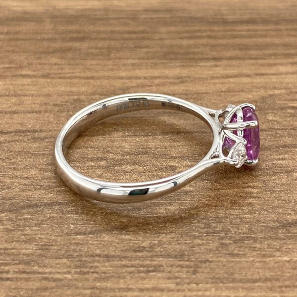 White gold ring with pink sapphire.