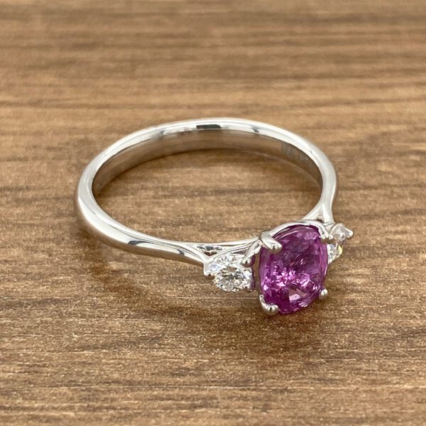 Pink sapphire and diamond engagement ring.