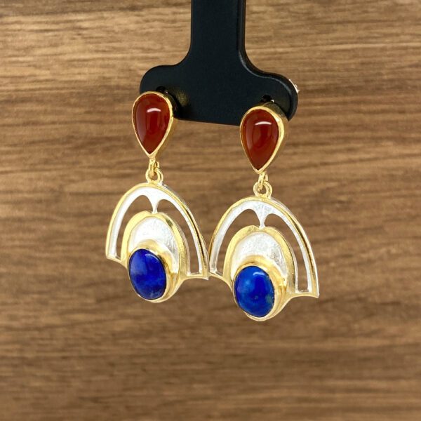 Gold earrings with blue and red stones.