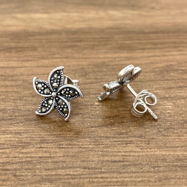 Silver flower stud earrings with marcasite.