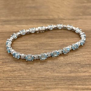 Aquamarine and diamond tennis bracelet.