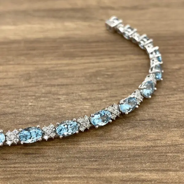 Aquamarine and diamond tennis bracelet.