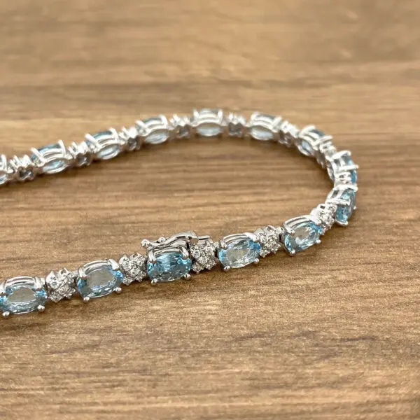 Aquamarine and diamond tennis bracelet.