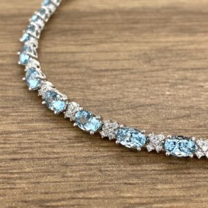 Aquamarine and diamond tennis bracelet.