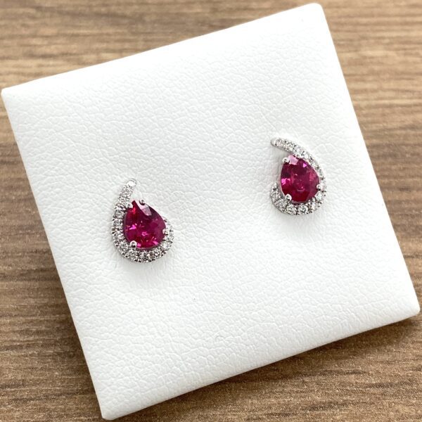 Ruby and diamond pear-shaped earrings.