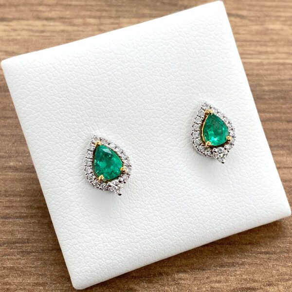 Emerald and diamond teardrop earrings.