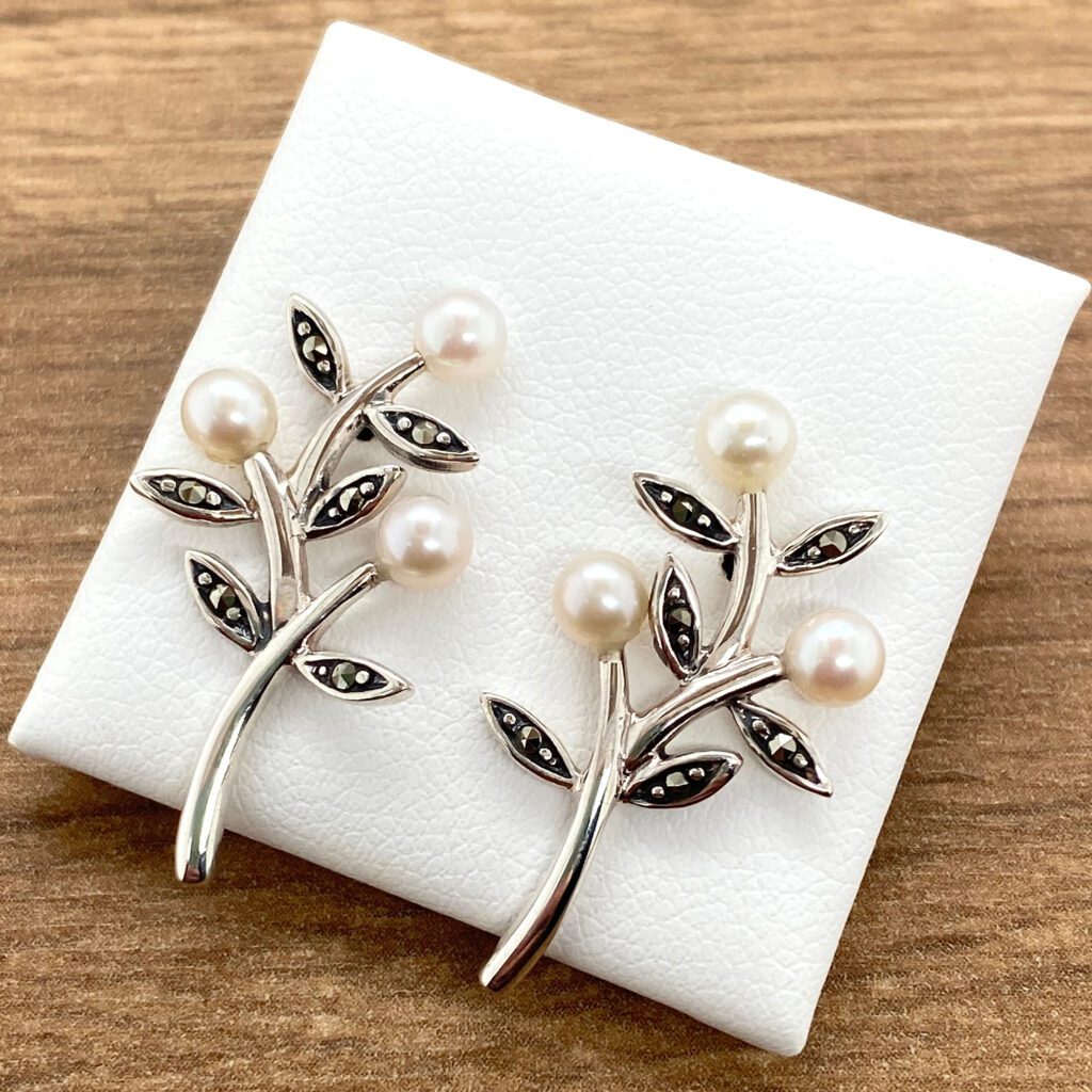 Pearl and marcasite branch earrings.