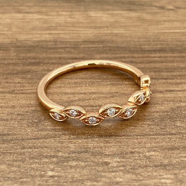 Rose gold diamond leaf ring.