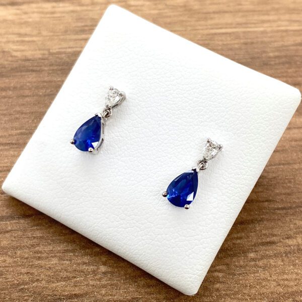 Elegant sapphire and diamond drop earrings.