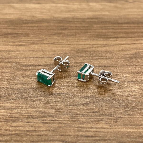 Emerald cut green gemstone earrings.