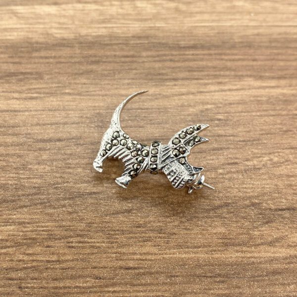 Silver marcasite dog brooch pin.