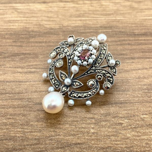 Elegant marcasite pearl brooch pendant.