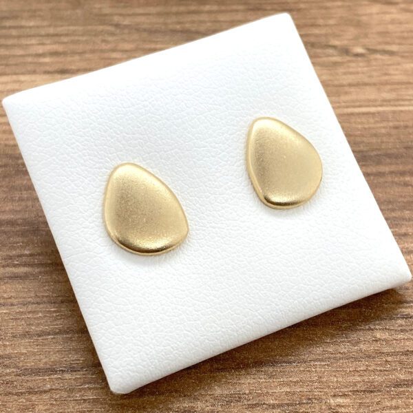 Gold pebble stud earrings.