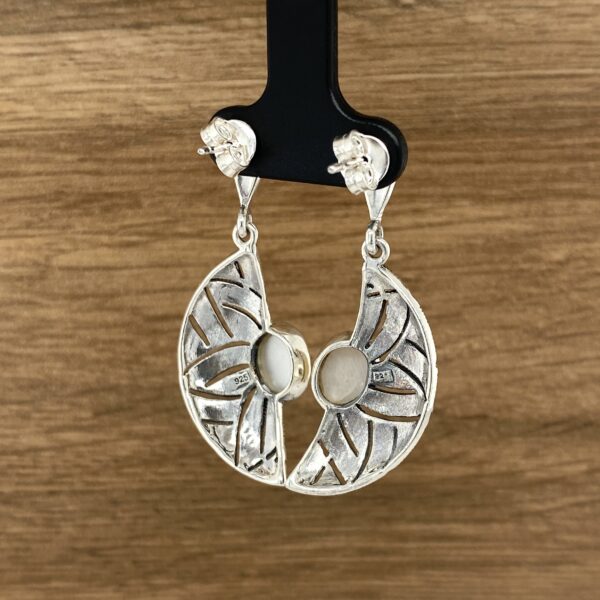 Silver filigree earrings with mother-of-pearl.