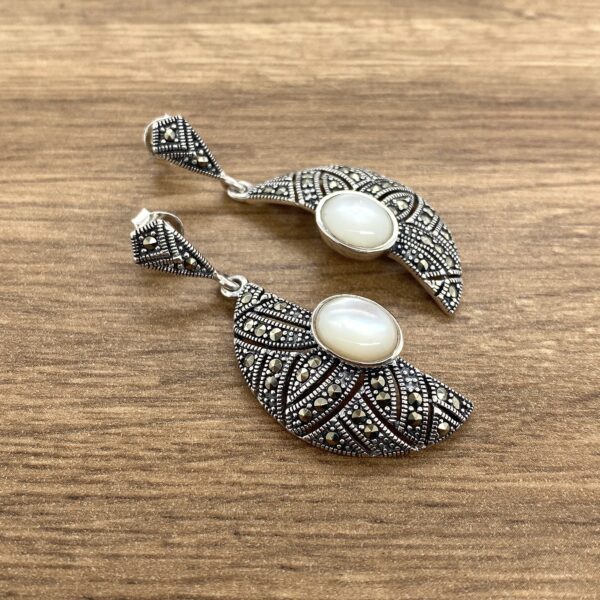 Marcasite and mother-of-pearl earrings.